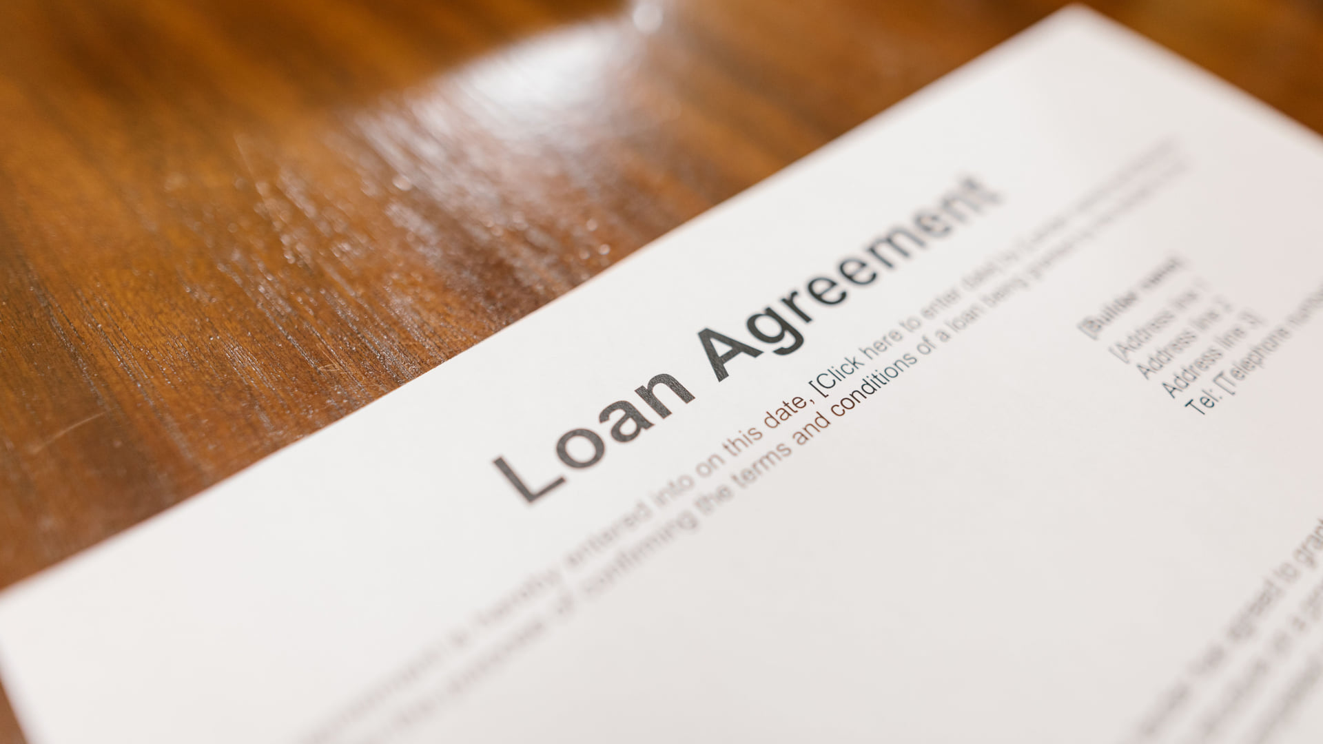 Small business owner reviewing SBA options
